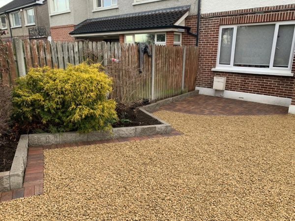 Gravel being laid on a driveway in Blennerville