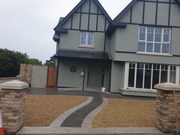 Gravel being laid on a driveway in Brosna