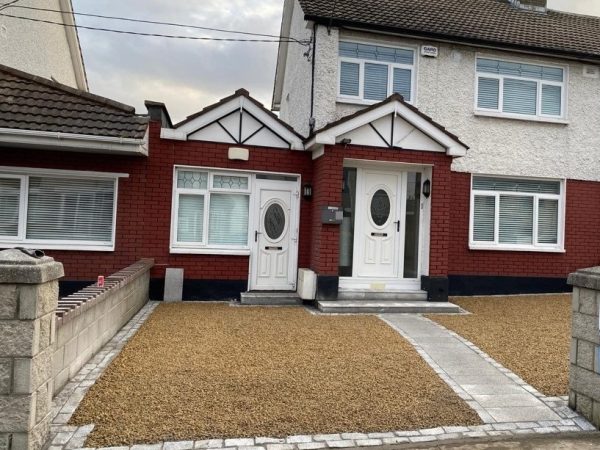 Gravel being laid on a driveway in Castlegregory