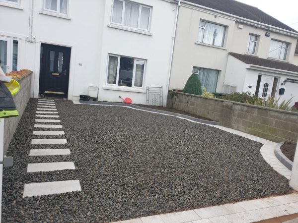 Gravel being laid on a driveway in Castleisland