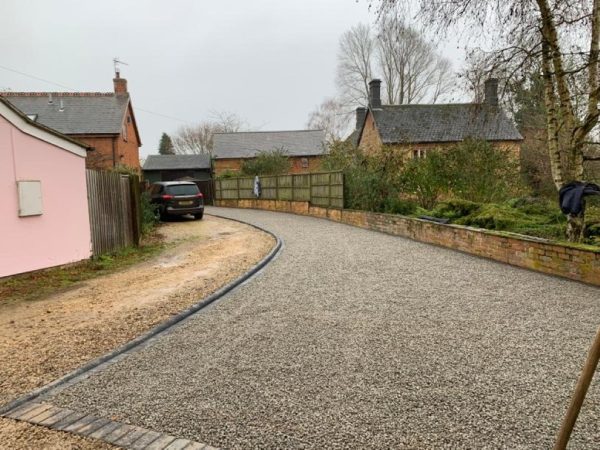 Gravel being laid on a driveway in Firies