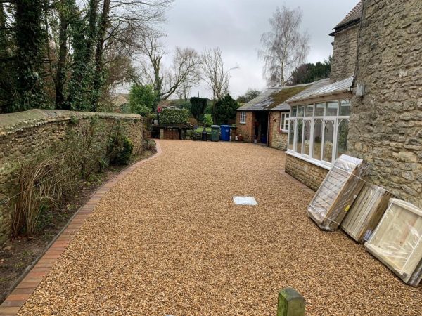 Gravel being laid on a driveway in Glenbeigh