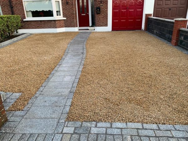 Gravel being laid on a driveway in Tralee